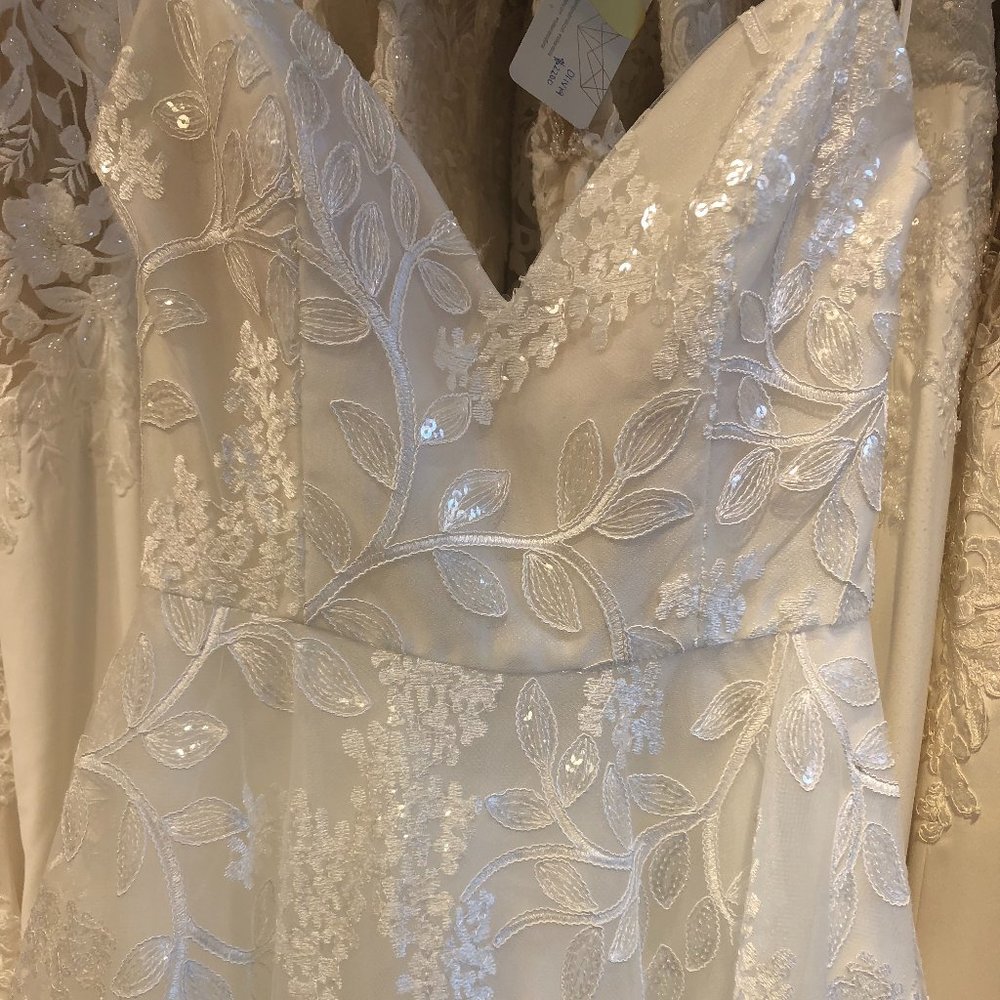 Ivory, a-line, spaghetti straps, lace all around, sequins